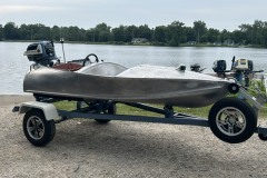 Feathercraft Firefly and 1958 Evinrude Sportwin 10
