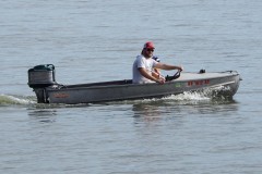 Josh and his family on the lake