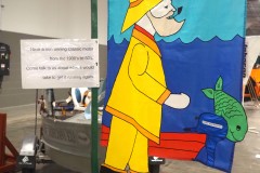 Paul's Friendly Fisherman banner with Scott Atwater outboard