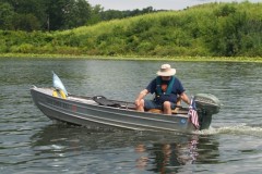 Paul in his '54 FeatherCraft Penguin and "54 Johnson 10