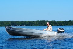 John F in his '57 Alumacraft with '57 Fastwin 18